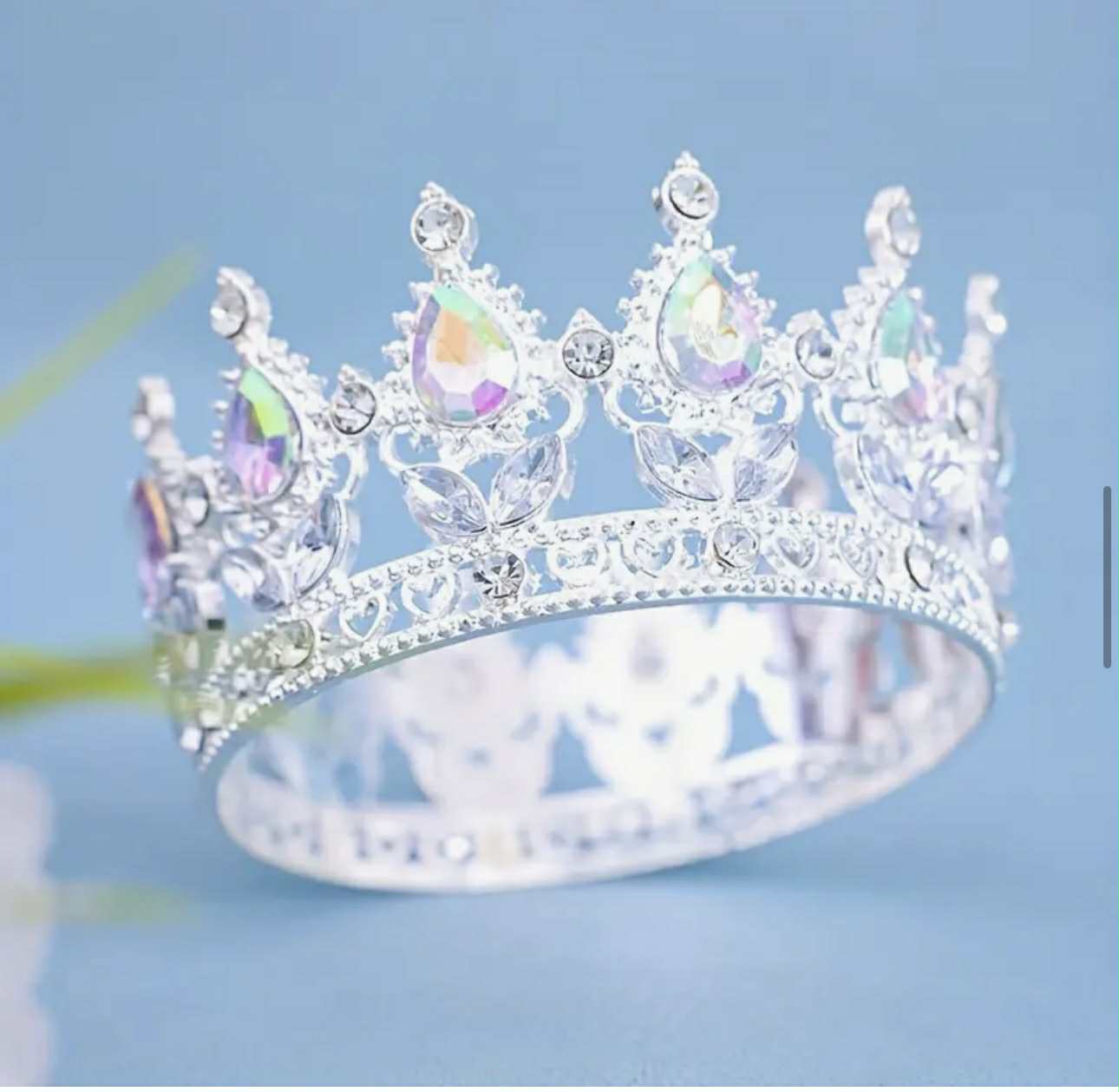 Silver metal crown with stones