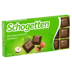 Schogetten Premium Alpine Milk Chocolate with Hazelnuts, 100g chocolate bar, individually portioned. A delight. Piece by piece.