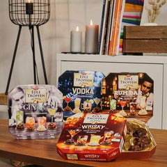 Edle Tropfen in Nuss Vodka Lounge 100g, liquid-filled chocolate pralines with milk chocolate glaze and crunchy pieces of hazelnut