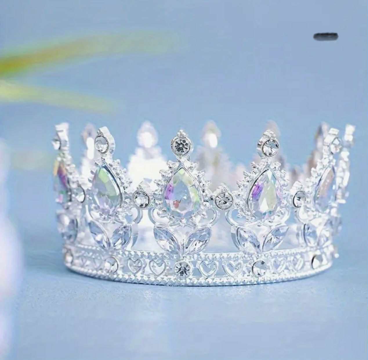 Silver metal crown with stones