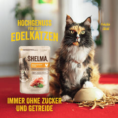 Hrană umedă pentru pisici Shelma cu curcan în sos cu roșii și ierburi – Hrană completă fără cereale cu conținut ridicat de carne – 28 x 85 g (2,38 kg)