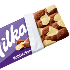 Milka Cow Spots – Alpine milk chocolate with white chocolate in cow spot design – 24 x 90g
