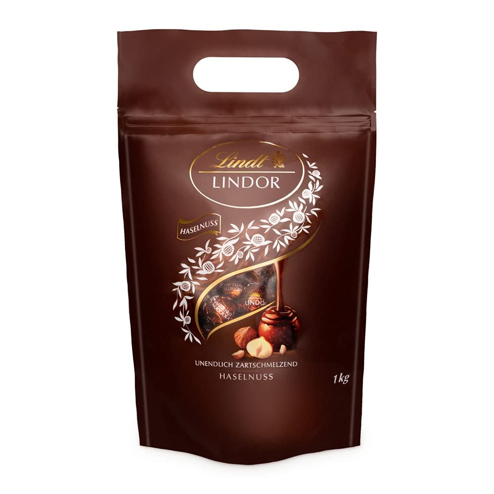 LINDOR chocolate balls with hazelnuts, 1 kg bag + Johnnie Walker Sherry barrel 0.7 liters