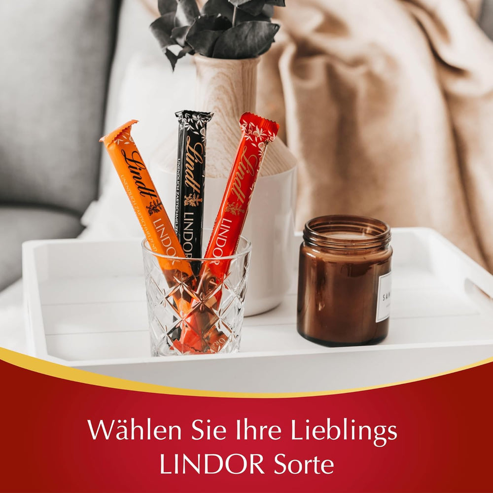 Lindt Chocolate | LINDOR milk chocolate sticks, Promotional offer | 100g | 4 LINDOR milk chocolate bars with melt-in-your-mouth filling | Chocolate Sticks (Pack of 3)