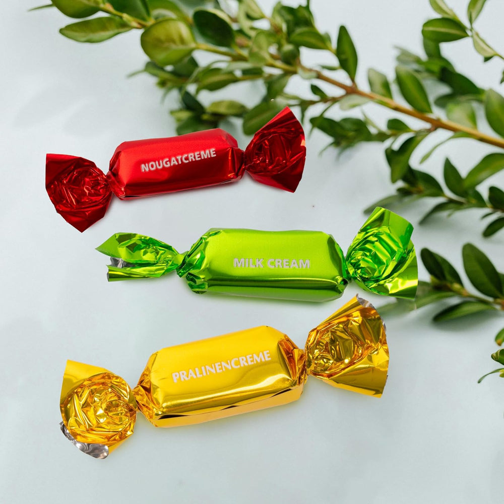 Heidel Easter card gift box 183g, premium milk chocolate praline with decorative metal box, ideal as an Easter gift