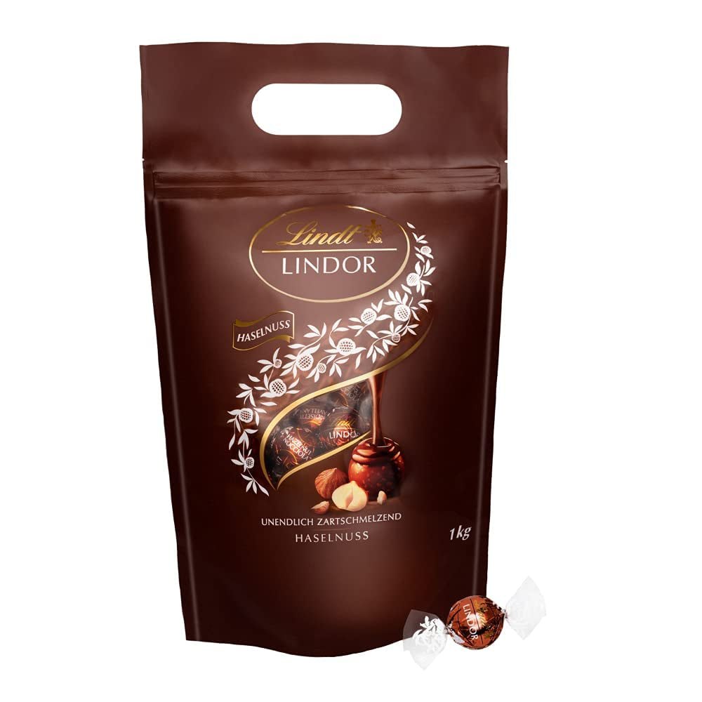 LINDOR chocolate balls with hazelnuts, 1 kg bag + Johnnie Walker Sherry barrel 0.7 liters
