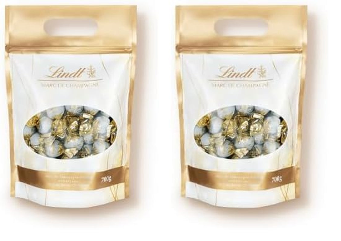 Lindt Marc de Champagne Chocolate Balls | 700 g Approx. 56 milk chocolate candies with refined filling, contains alcohol | Bulk package | Gift of chocolate | Chocolate gift