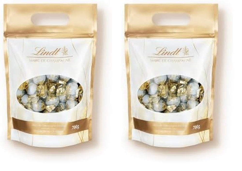 Lindt Marc de Champagne Chocolate Balls | 700 g Approx. 56 milk chocolate candies with refined filling, contains alcohol | Bulk package | Gift of chocolate | Chocolate gift