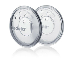 Medela breast shells - BPA-free, made of soft silicone, with breathable ventilation holes, includes 2 shells Accessories Food and Breastfeeding Bebe Naty Shop