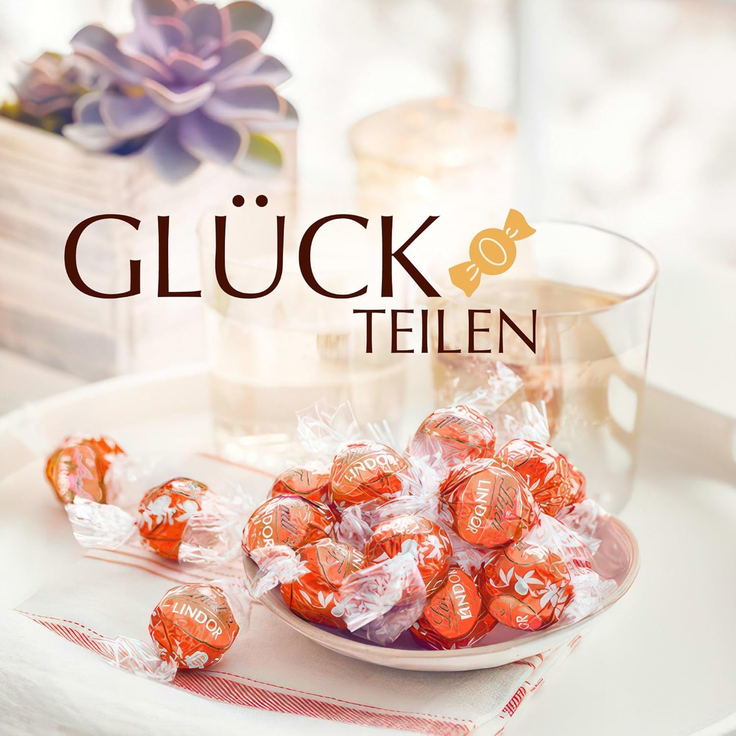 Lindt LINDOR Red Orange Chocolate Balls | 1 kg resealable bag | approx. 80 chocolate candies with melt-in-your-mouth filling | Bulk package, chocolate gift