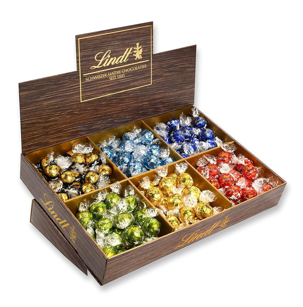 Lindor Chocolate Top Presentation | 1718 g and chocolate bars with marzipan | 25 bars x 50g in a counter display | 1250 g | Pure marzipan covered with dark chocolate | Chocolate bars