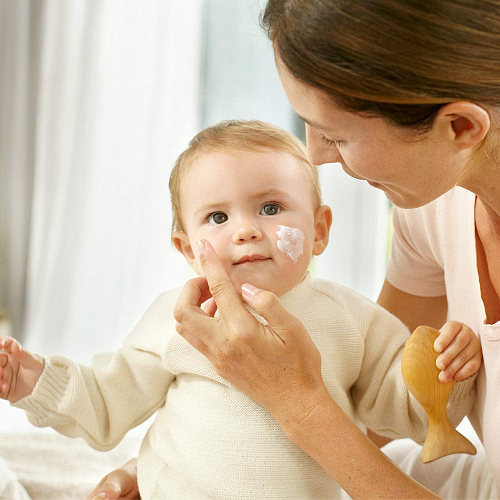 WELEDA Organic Baby Calendula Magic Balm - Balsam universal de cosmetice naturale pentru față și corp pentru îngrijirea și calmarea pielii și buzelor uscate. Balsam bogat universal pentru bebeluși și copii (1x 25g) Copii - Baie si Skincare Naty Shop